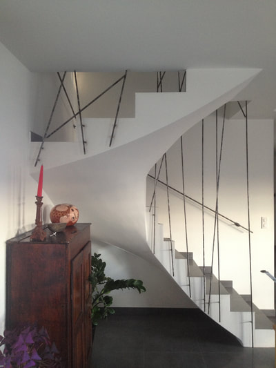 escalier béton 
Garde corps métallique décoratif